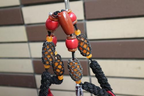 プラダのビーズハンドルナイロントートバッグ