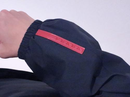 袖ロゴナイロンジャケットのメンズ