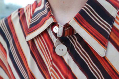 エムエーエスユーのシャツ