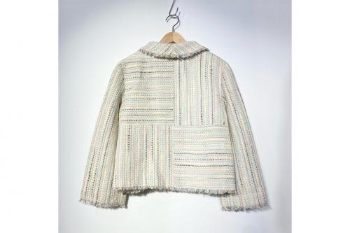 シャネルのシャネルウッドボタンツイードジャケット