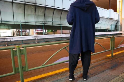 プリーツフーデットコートのISSEY MIYAKE