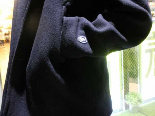 トップスのメルトンコート