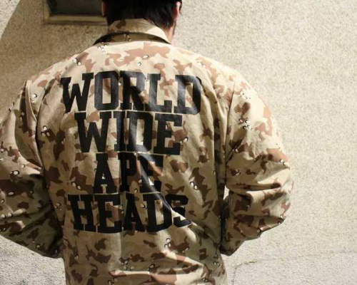 トップスのコーチジャケット