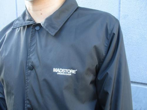 バックプリントコーチジャケットのメンズ