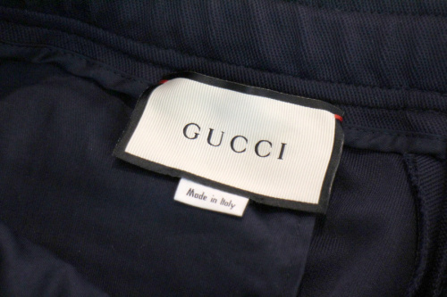 グッチのストライプジョギングパンツ