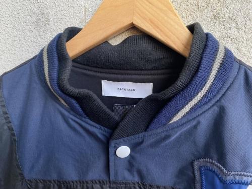 ファセッタズムのMIXED STADIUM JACKET