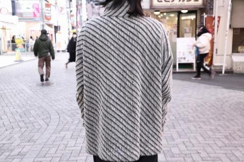 アティムウールハイネックニットのAtim Sweater