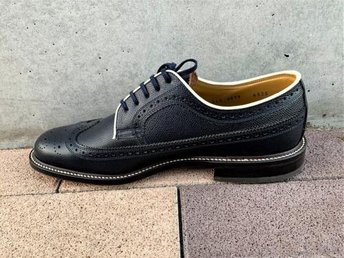 リーガル×グラッドハンドのウィングチップチップシューズ