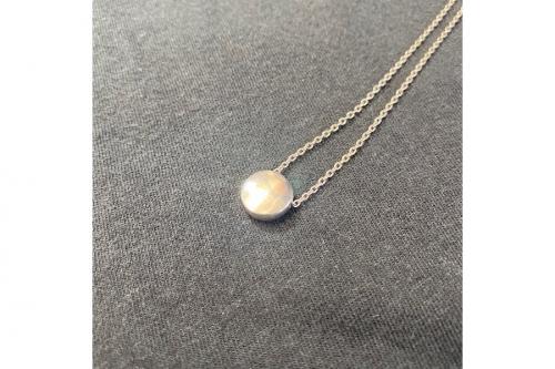 コーチのオープンサークルストーンスタンドネックレス