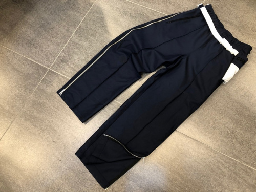 メゾンマルジェラのWOOL POPELINE SIDE ZIP PANTS