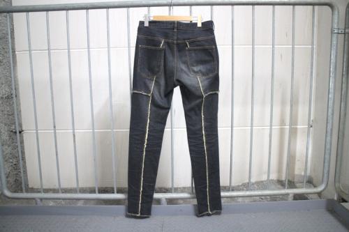 ジョンアンダーカバーのハギストレッチデニムパンツ