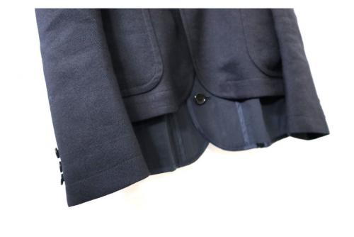 トリコ コム デ ギャルソンのノーカラーレイヤードジャケット