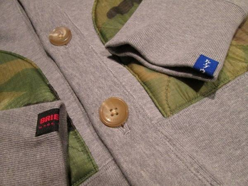 トップスのカーディガン