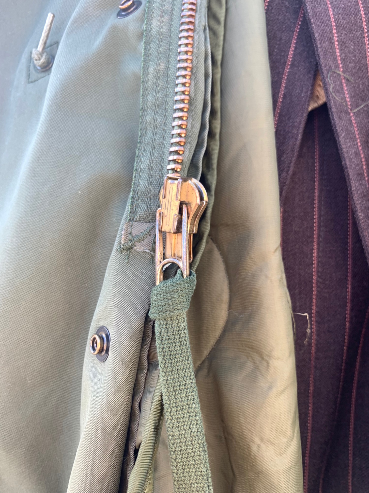 定番アイテムであるM-65フィッシュテールパーカーの装いを再考したい