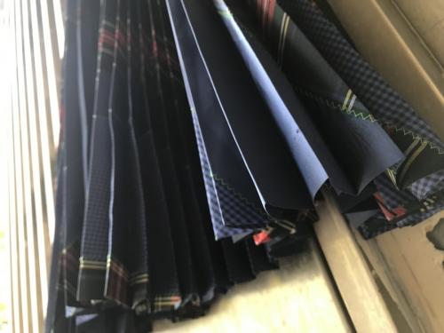 チェック柄プリーツスカートのユニセックス