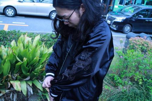 トップスのstussy