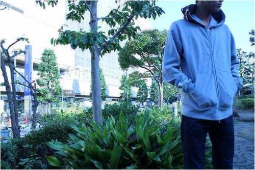 トップスのパーカー