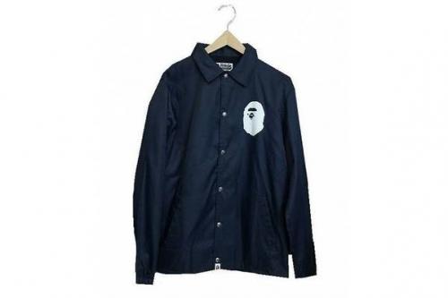 トップスのコーチジャケット