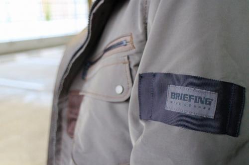 ブリーフィング × ウィルラウンジのフーデットジャケット