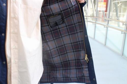 SLソルウェイジッパージャケットのネイビー