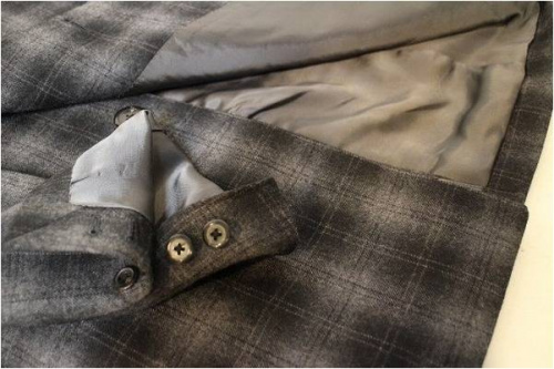 コートのLAD MUSICIAN