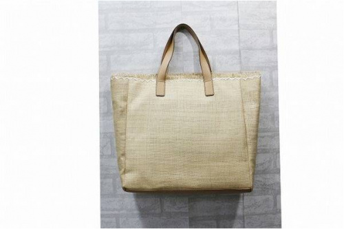 ANYA HINDMARCHのストローバッグ