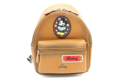 コーチ × ディズニーのコラボレザーリュック　ディズニー　ミッキー　F59356