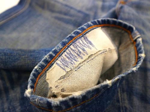 ペイント＆ダメージデニムパンツの与野